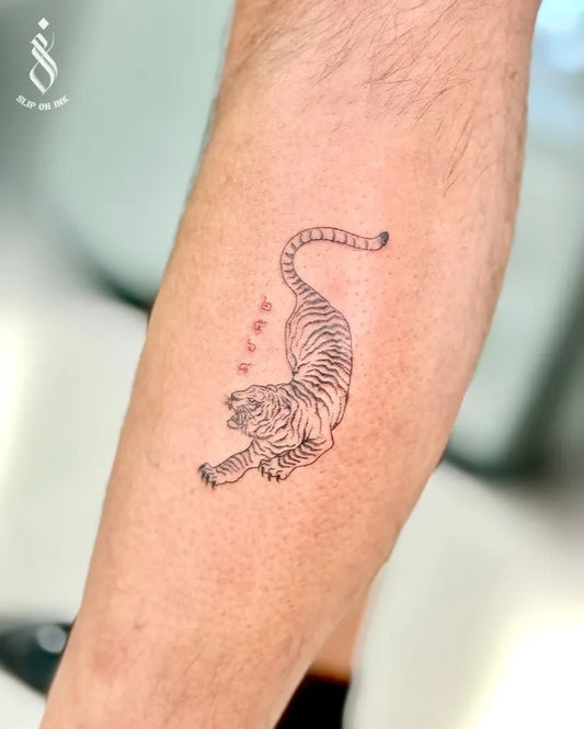 Small Fine Line Tiger with Dots on Men Arm Tattoo by @sliponink