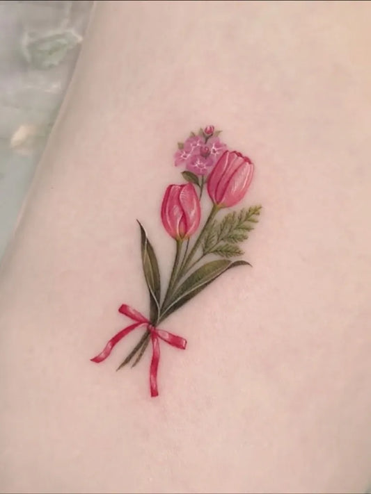 Small Fine Line Tulip Bouquet Tattoo on Women Forearm by @tattooist.haneul