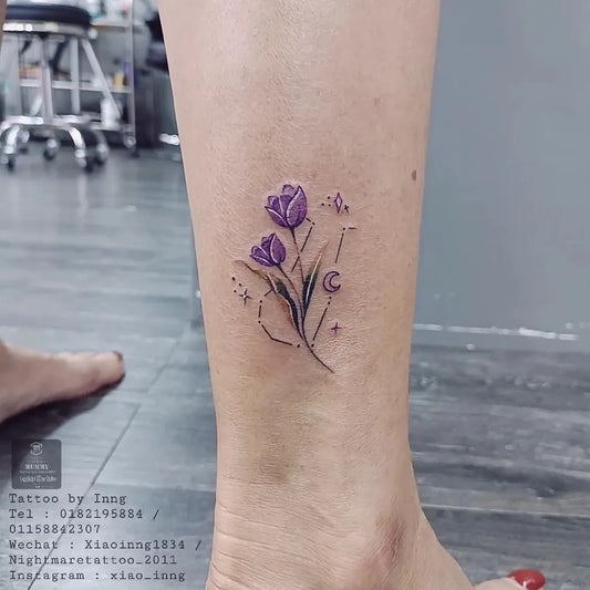 Small Fine Line Tulip Crescent Tattoo on Women Ankle by @xiao_inng