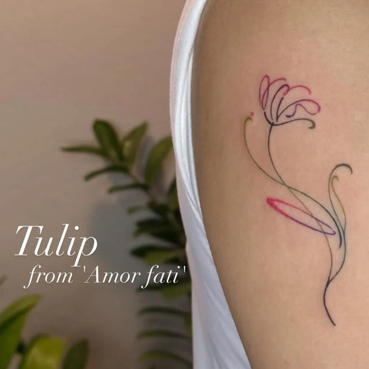 Small Fine Line Tulip Tattoo on Women Arm by @d.mension_tattoo