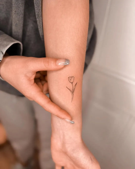 Small Fine Line Tulip Women Forearm Tattoo on by @tinytattoos_feathertouch