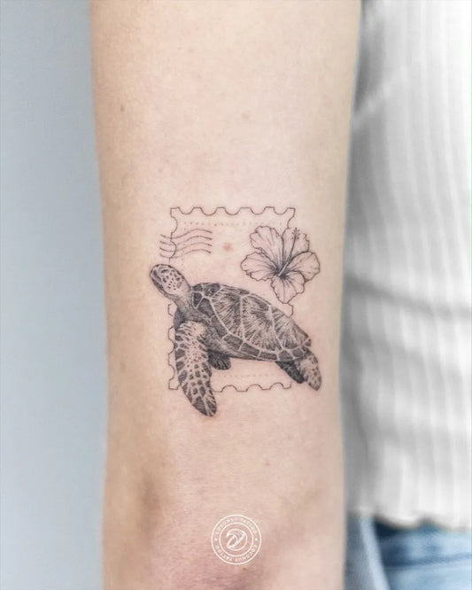 Small Fine Line Turtle Stamp and Hibiscus Tattoo on Women Arm by @coconut_tattoo_