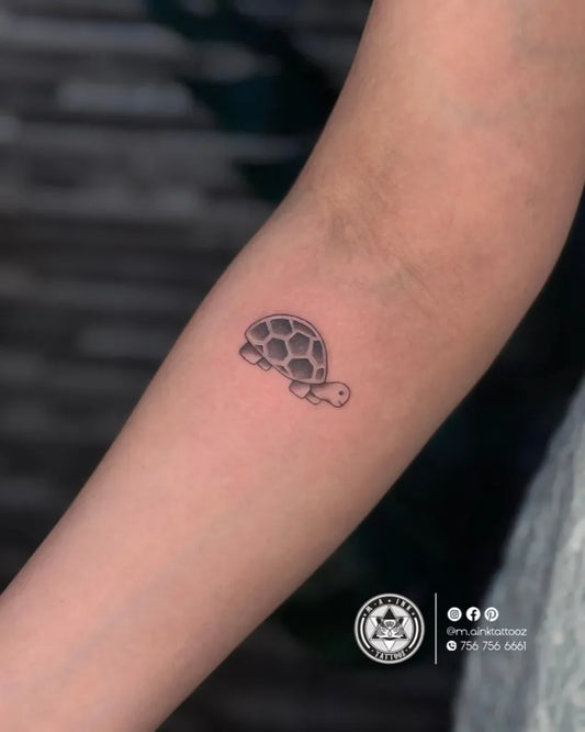Small Fine Line Turtle Tattoo on Women Forearm by @m.ainktattooz