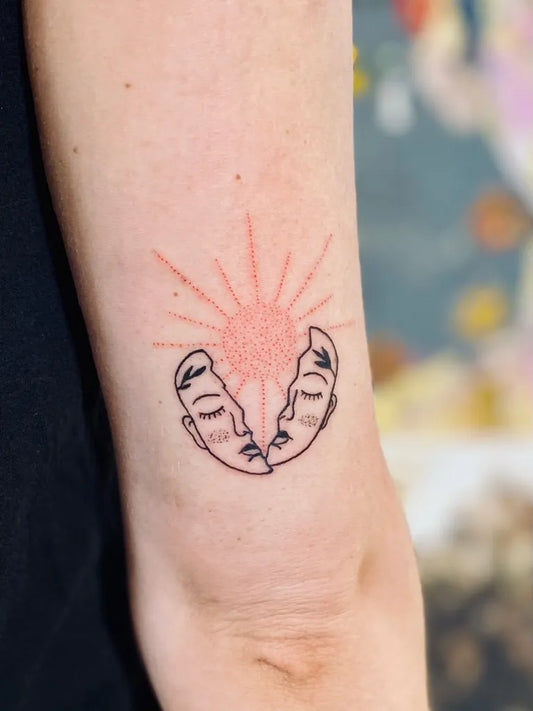 Small Fine Line Twin Faces Sun on Women Arm Tattoo by @why.so.sweettt