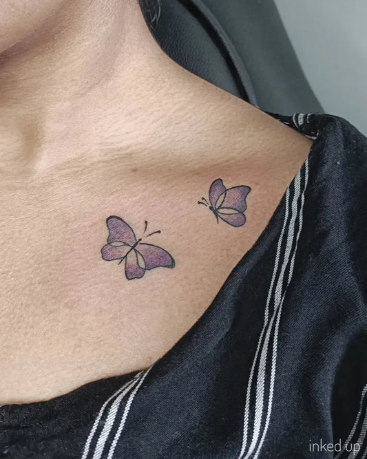 Small Fine Line Two Butterflies Tattoo on Women Collarbone by @koracanvastattoo