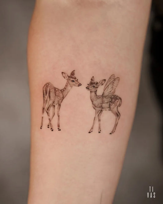 Small Fine Line Two Deer Tattoo on Women Arm by @tivas