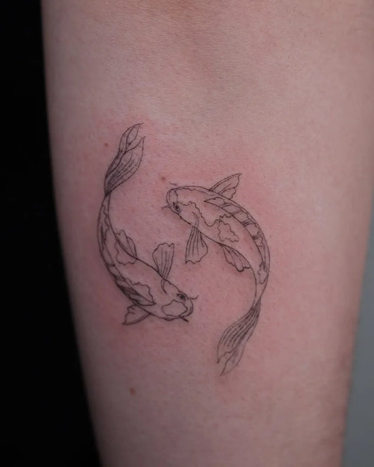 Small Fine Line Two Koi Fish Tattoo on Women Arm by @studio4.no