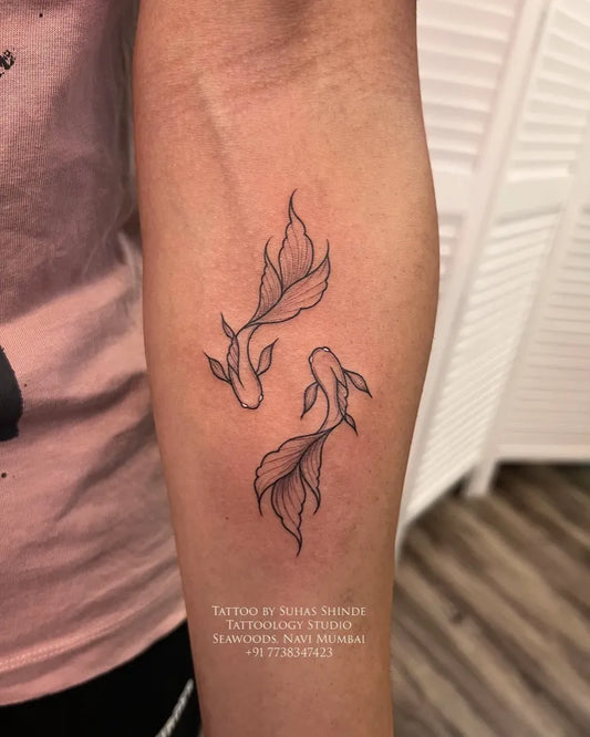 Small Fine Line Two Koi Fish Tattoo on Women Arm by @tattoology_studio