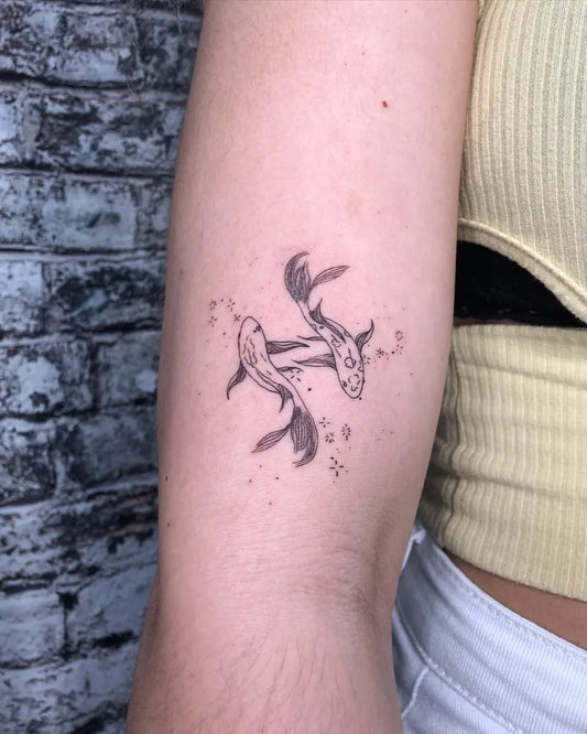 Small Fine Line Two Koi Fish Tattoo on Women Arm by @tattsbyjona