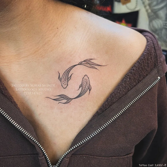 Small Fine Line Two Koi Fish Tattoo on Women Shoulder by @tattoology_studio