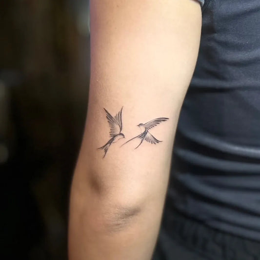 Small Fine Line Two Swallows Tattoo on Women Arm by @ajito.osaka.tattoo
