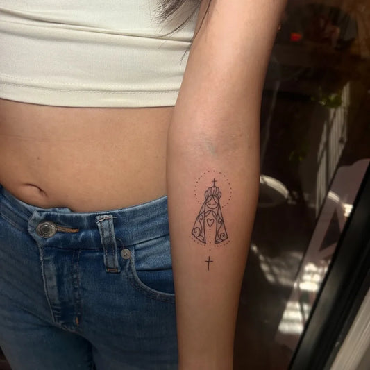 Small Fine Line Virgin Mary Tattoo on Women Arm by @tattoosbyskyeee