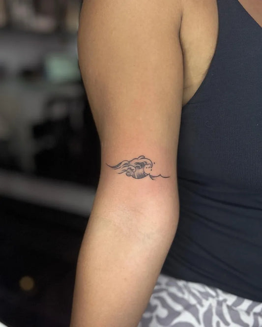 Small Fine Line Wave Tattoo on Women Arm by @yanninkstattoo