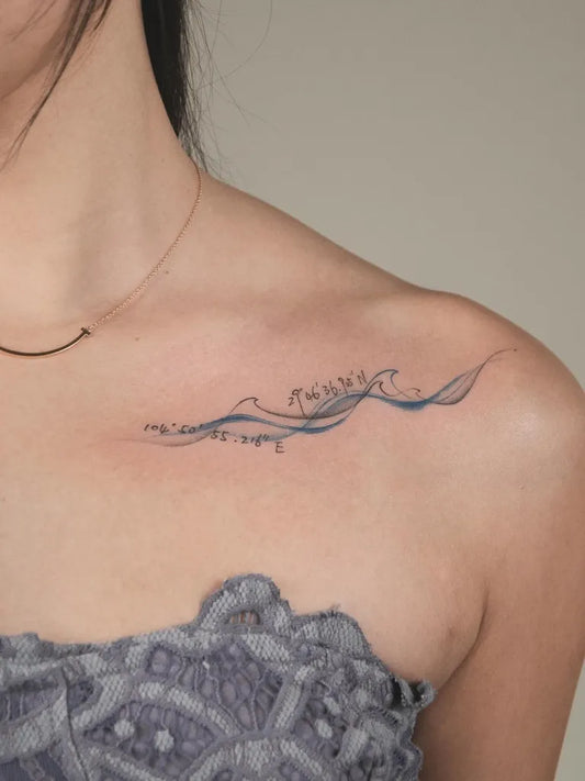 Small Fine Line Wave and Script Tattoo on Women Shoulder by @moko.cjtattoo