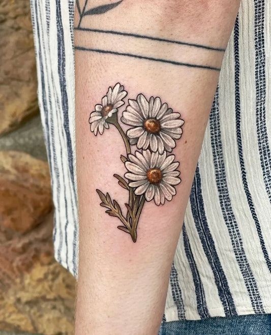 Small Fine Line White Daisy Bouquet Tattoo on Women Arm by @thetattoolady.pa