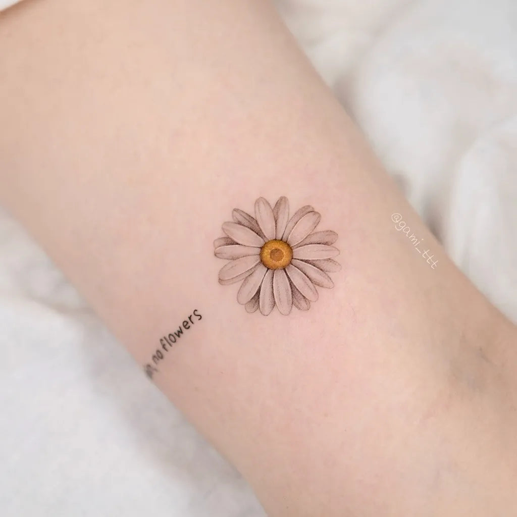 Small Fine Line White Daisy Tattoo on Women Arm by @gami_ttt