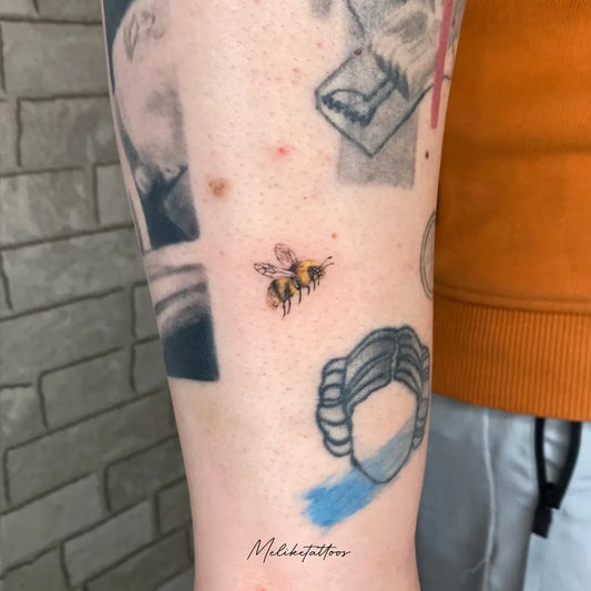 Small FineLine Bee Women Arm Tattoo by @meliketattoos