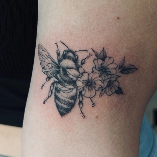 Small FineLine Bee and Flowers on Women Arm Tattoo by @anjablack.ink