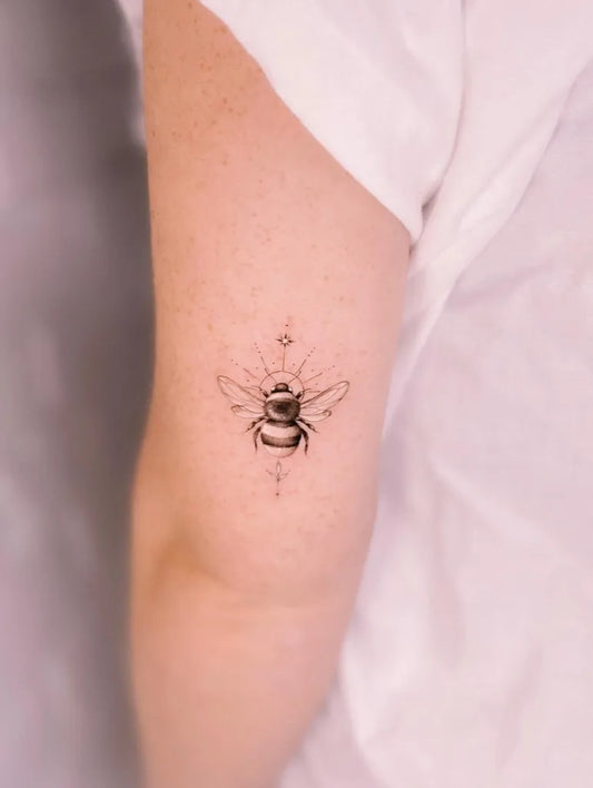 Small FineLine Bee with Dots on Women Arm Tattoo by @marytattooer