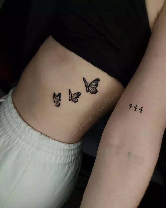 Small FineLine Butterflies and 444 on Women Side Tattoo by @nicolaspresidentetattoos