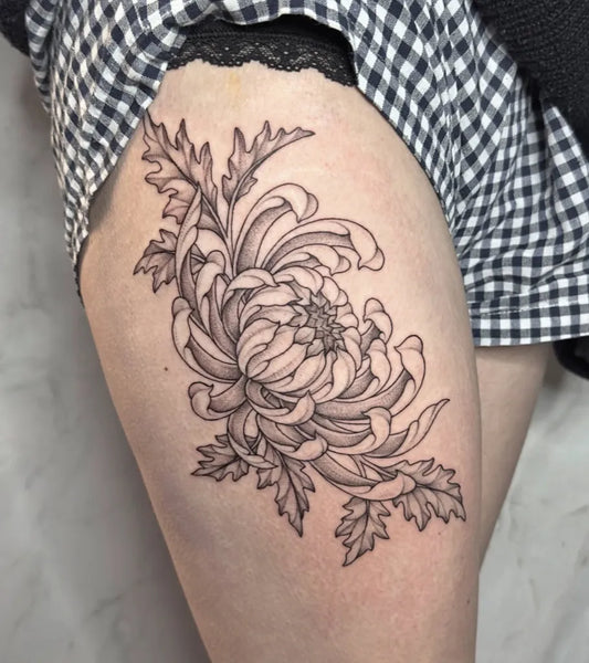 Small FineLine Chrysanthemum on Women Thigh Tattoo by @tabfab_tattoo