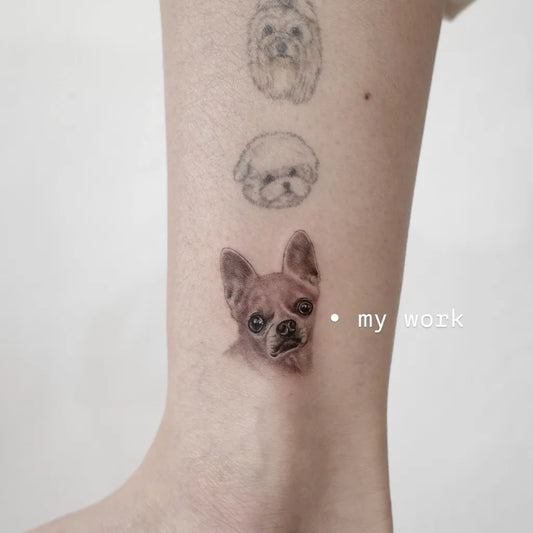 Small FineLine Dog Tattoo on Women Leg by @twodogs.tattoo.space