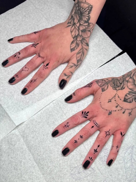 Small FineLine FleurDeLisAndStars on Women Fingers Tattoo by @belinda_tattoos1