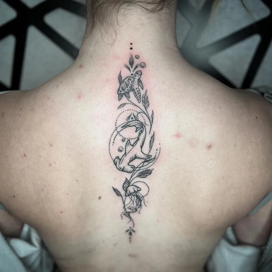 Small FineLine FloralBird on Women Spine Tattoo by @staysonyamind