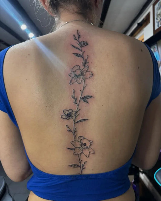 Small FineLine FloralVine on Women Spine Tattoo by @alexmtattoos