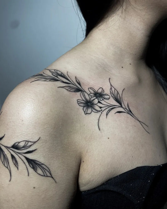 Small FineLine Flowers and Leaves on Women Shoulder Tattoo by @budatattoo_hospitalet