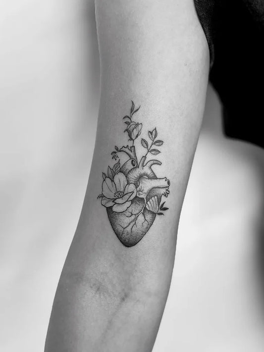 Small FineLine Heart Flower on Women Arm Tattoo by @myketattzz