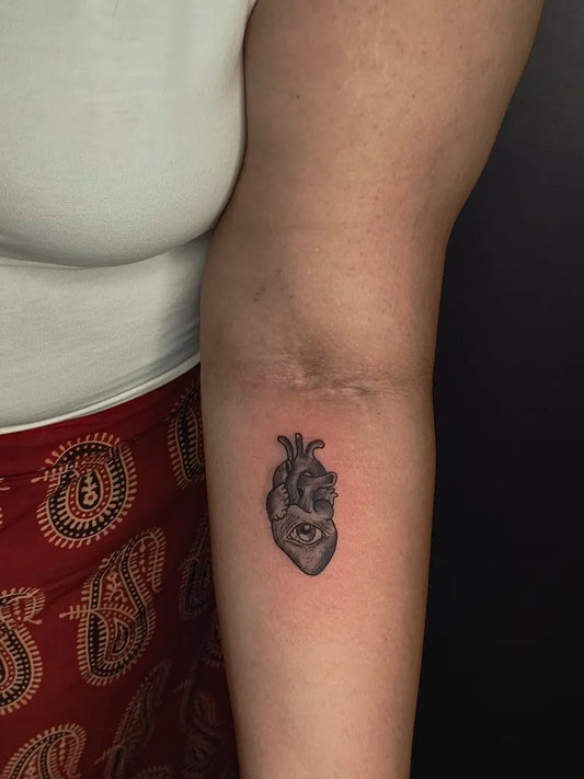 Small FineLine Heart on Women Arm Tattoo by @microtattoostudio