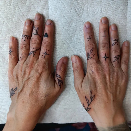 Small FineLine Leaves Stars Hearts on Women Fingers Tattoo by @inkaddict_808