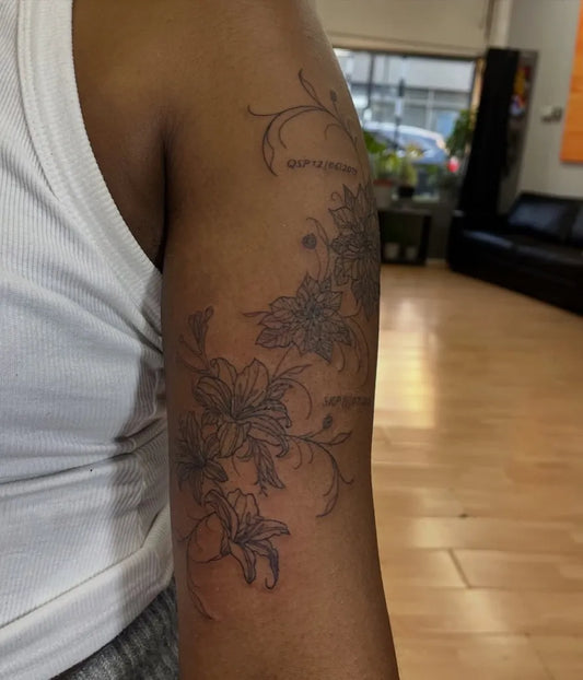 Small FineLine Lily Vines on Women Arm Flower Tattoo by @inkcay