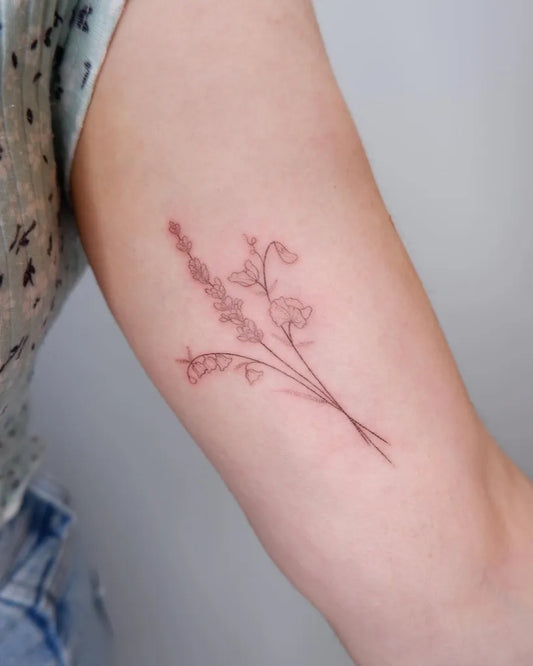 Small FineLine Lily of the Valley and Peas on Women Arm Tattoo by @fayeotattoos