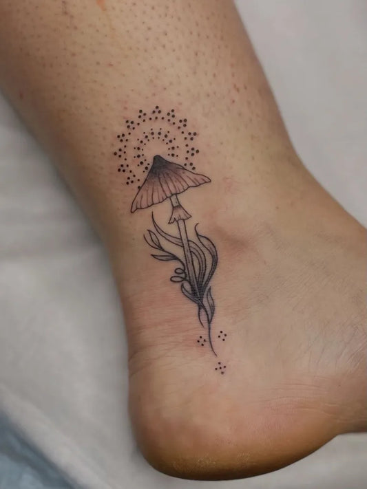 Small FineLine Mushroom on Women Ankle Tattoo by @alexsteiger