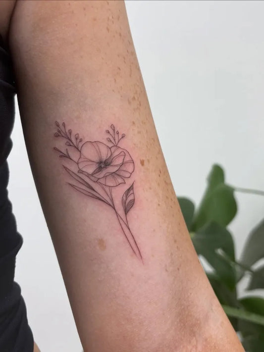 Small FineLine Poppy Flowers Tattoo on Women Arm by @elliehavis.tattoo