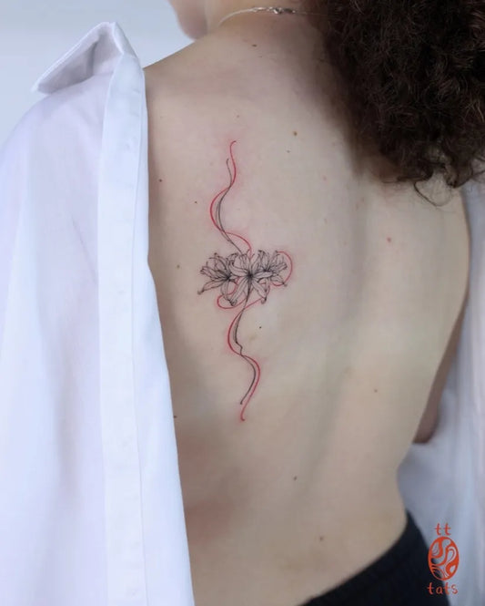 Small FineLine Red Spider Lily Tattoo on Women Upper Back by @tt.tats