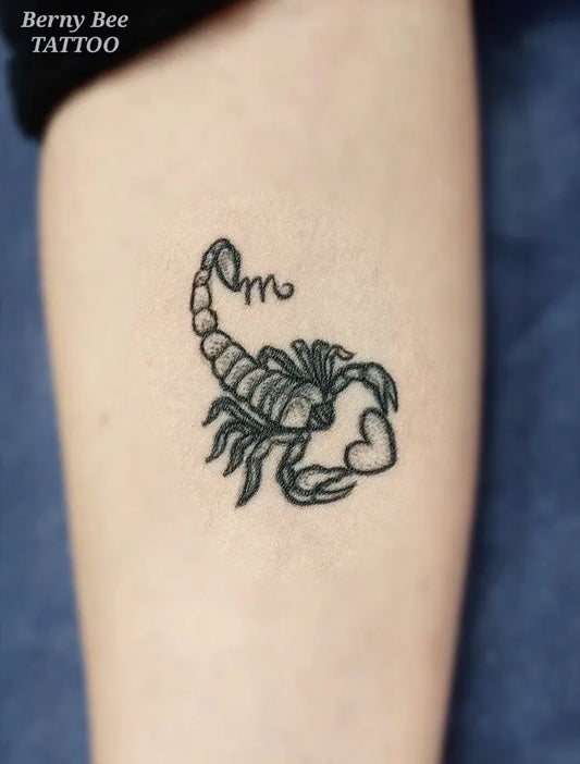 Small FineLine Scorpion with Heart and Letter on Women Arm Tattoo by @bernybee_tattoo