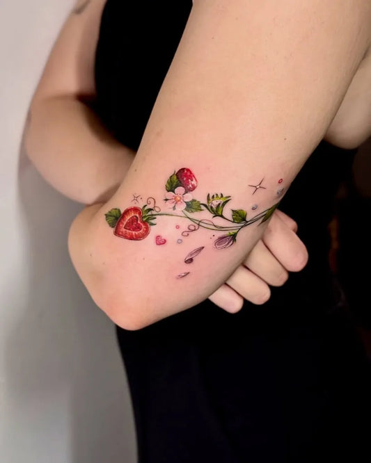 Small FineLine StrawberryVine Women Arm Flower Tattoo by @wixien_artworks