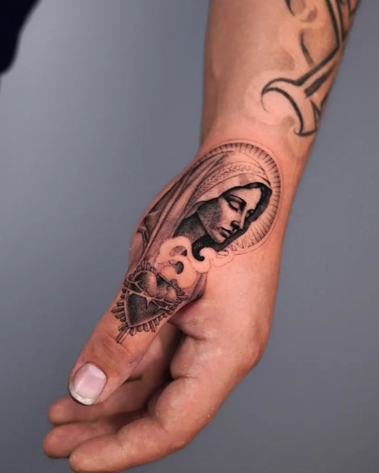 Small FineLine VirginMarySacredHeart on Men Hand Religious Tattoo by @inker_land
