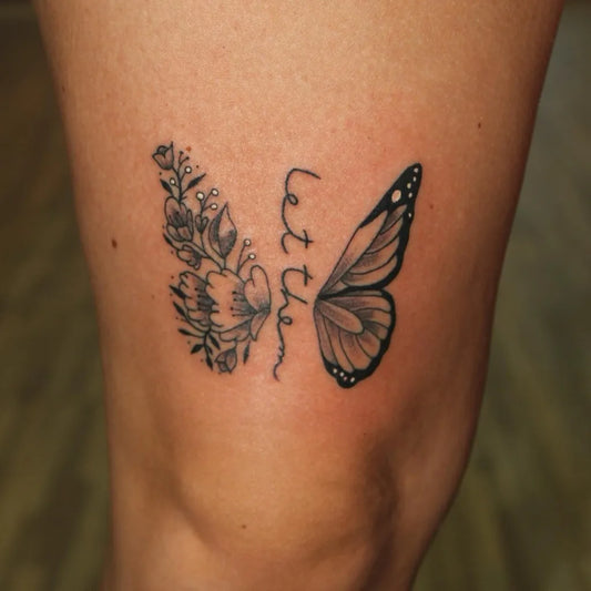 Small Floral Butterfly and Let Them on Women Thigh Tattoo by @heart_of_ink_tattoo_