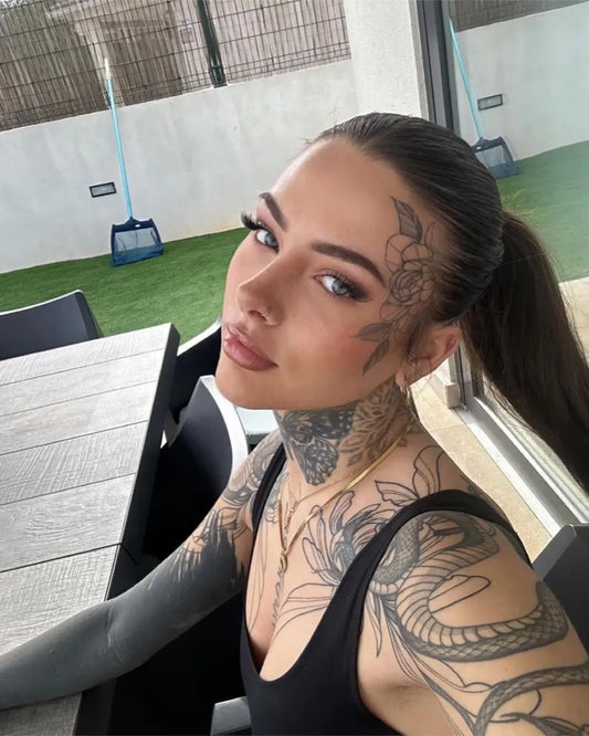 Small Floral Flower on Women Face Tattoo by @face_tattoo_girls