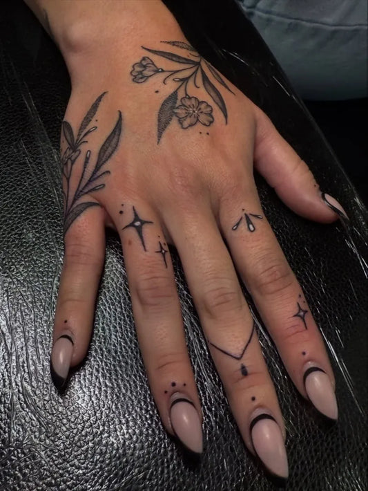 Small Floral Flowers Leaves Dots on Women Fingers Tattoo by @phancyinkd