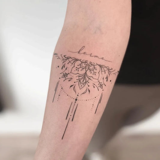 Small Floral Mandala Lotus and Flowers on Women Arm Tattoo by @michaela.ink.art