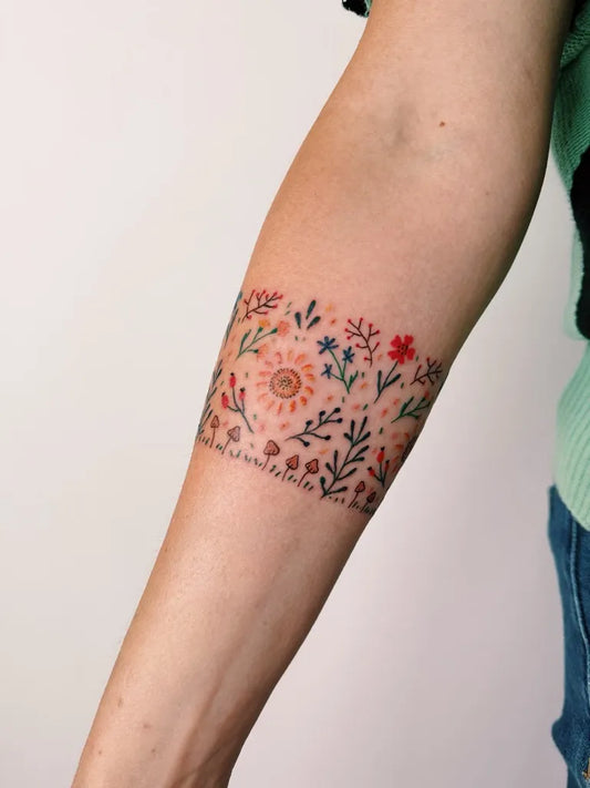 Small Floral Sunflowers and Wildflowers on Women Arm Flower Tattoo by @zhuk_alyona
