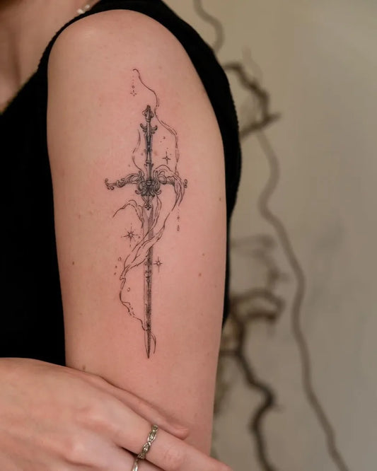 Small Flowy Line Sword and Smoke on Women Upper Arm Tattoo by @anna.tattoo.w