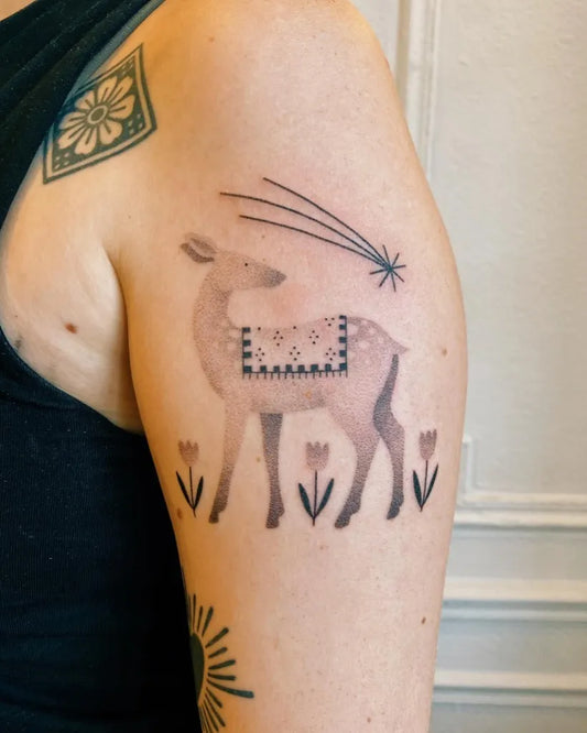 Small Folk Art Deer with Flowers and Comet Tattoo on Women Arm by @annasuperpoke