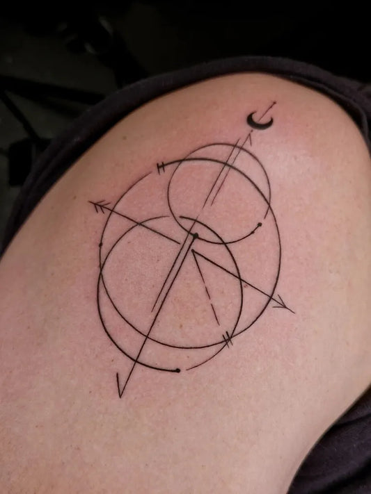 Small Geometric Compass Rose and Crescent Moon on Women Shoulder Tattoo by @velvetgypsytattoos