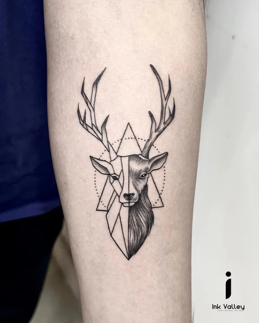 Small Geometric Deer Tattoo on Men Arm by @ink_valley_tattoo
